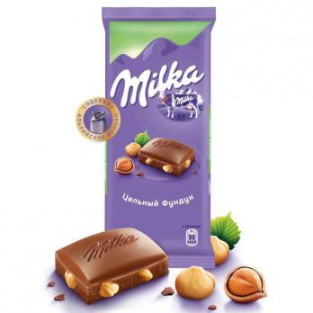 Шоколад Milka плитка молоч.с цельным.фунд.100г